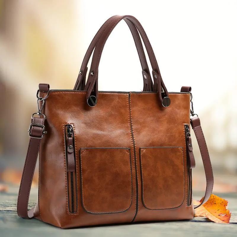 Women's genuine leather handbag, durable with adjustable strap. Perfect shoulder or crossbody bag.