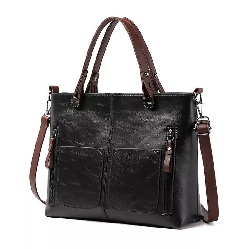 Elegant brown women's leather shoulder bag, versatile for everyday use. Durable with adjustable strap.