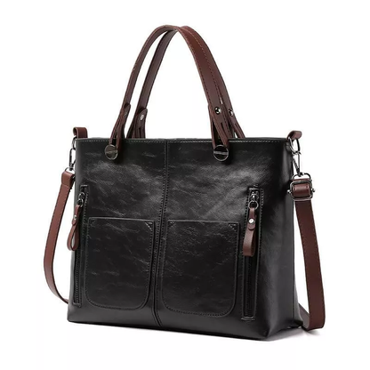 Elegant brown women's leather shoulder bag, versatile for everyday use. Durable with adjustable strap.