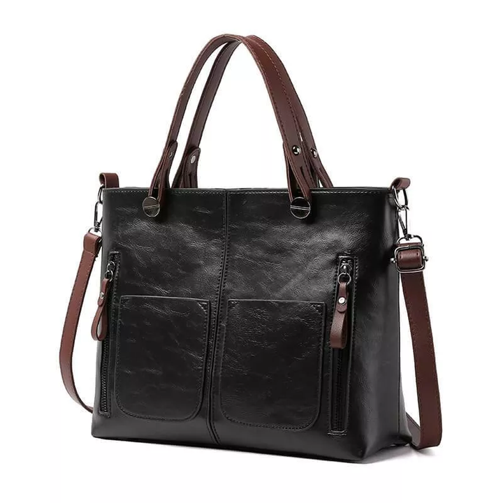 Elegant brown women's leather shoulder bag, versatile for everyday use. Durable with adjustable strap.