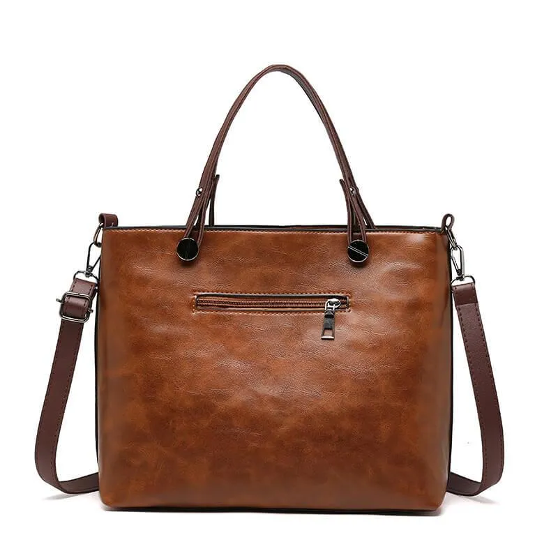 Adjustable strap women's leather handbag. Durable and elegant for everyday shoulder or crossbody use.