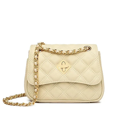 Luxurious women's genuine leather quilted handbag, showcasing fine texture and elegant design with chain strap.