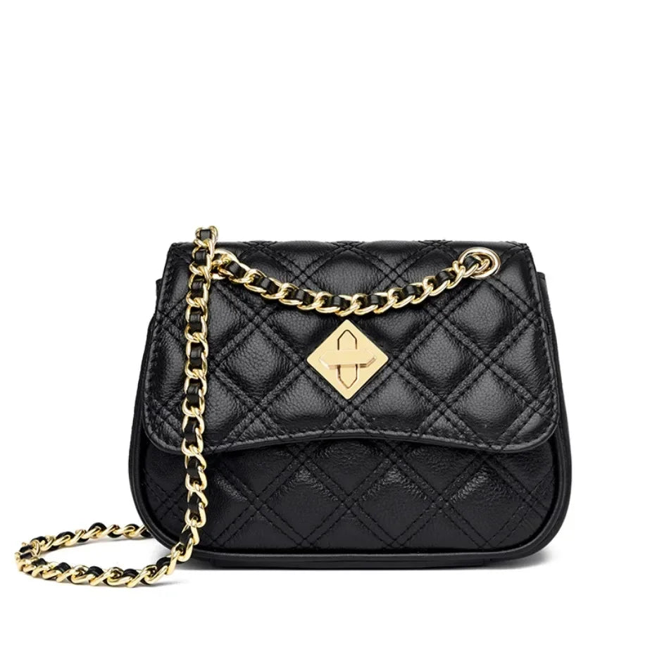 Elegant and luxurious genuine leather quilted women's handbag. Compact purse with chain strap and twist lock.