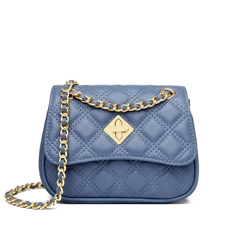 Chic genuine leather quilted women's compact purse for evening. Crossbody or shoulder bag with chain strap.