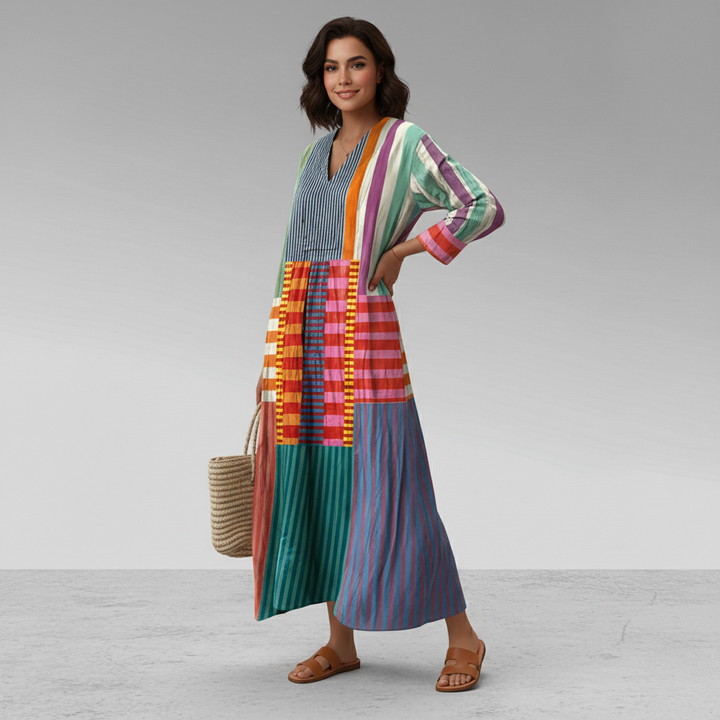 Boho-style women's long sleeve maxi caftan dress with vibrant geometric print, ideal for casual vacation.