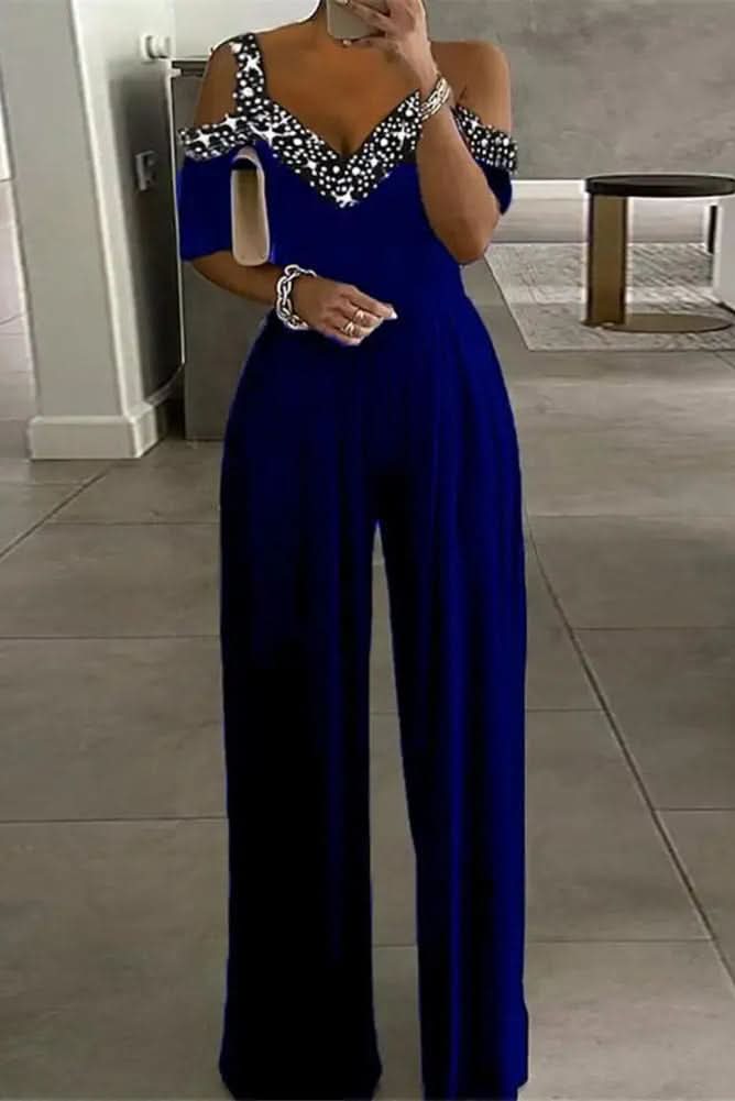Stylish women's rhinestone jumpsuit, a glamorous one-piece evening outfit for fashion-forward special occasion wear.