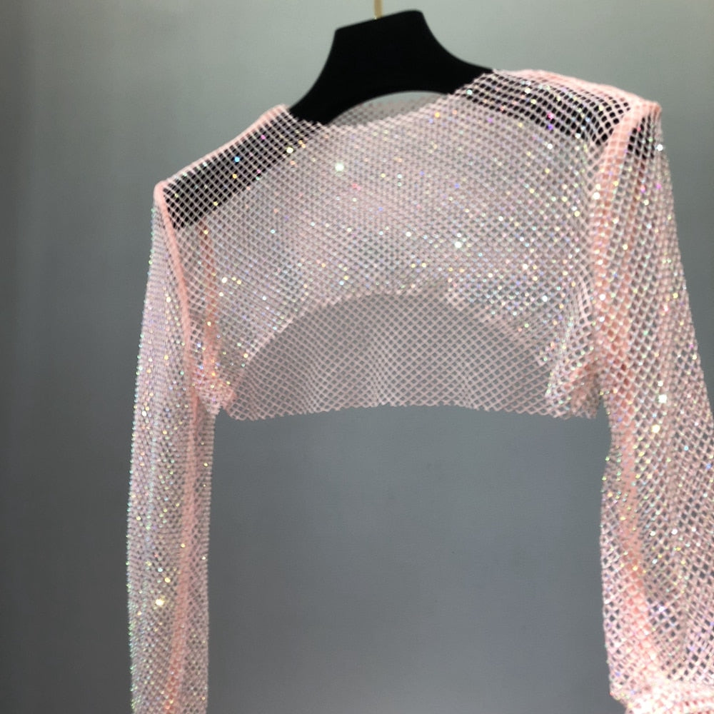 Chic women's sheer party top, embellished with sparkling rhinestones. Perfect for club & night out fashion.