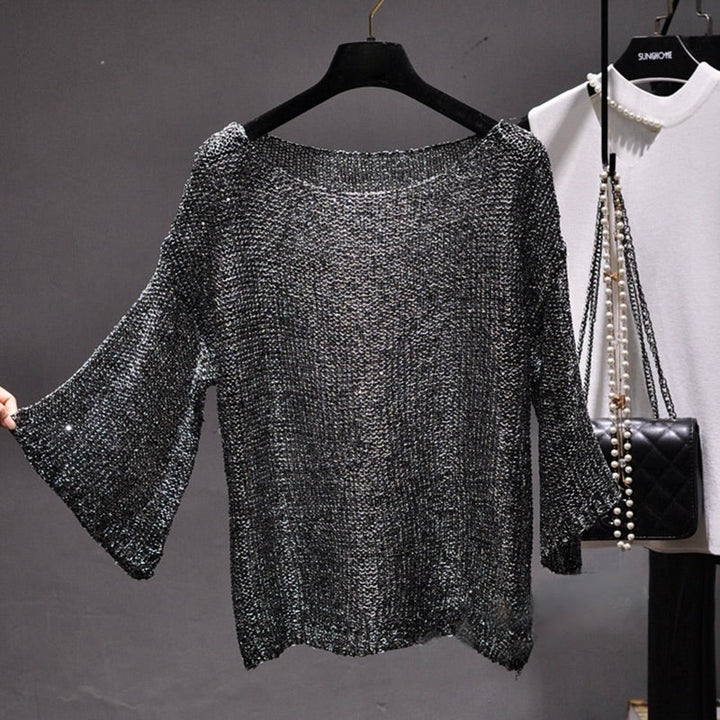Comfortable women's sequin knit sweater. Stylish long sleeve top with glamorous sparkle, ideal for fashion-forward party outfits.