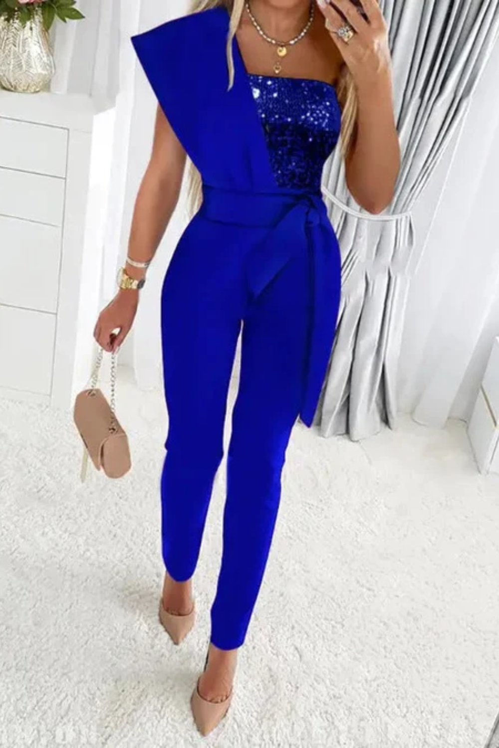Glamorous women's sequin one-piece jumpsuit, designed for cocktail parties & evening events.