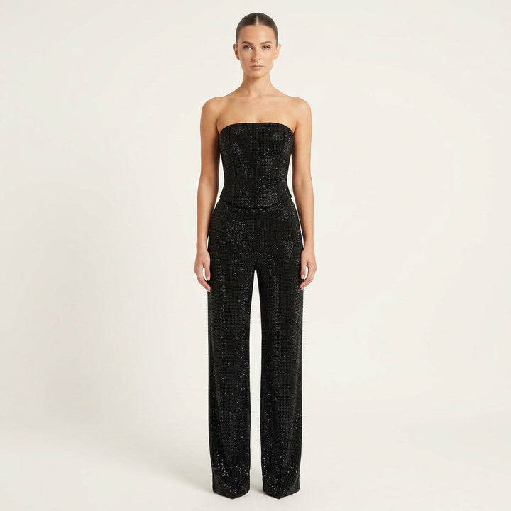 Women's glitter crop top & high-waist jeans matching set. Perfect party or night out outfit.