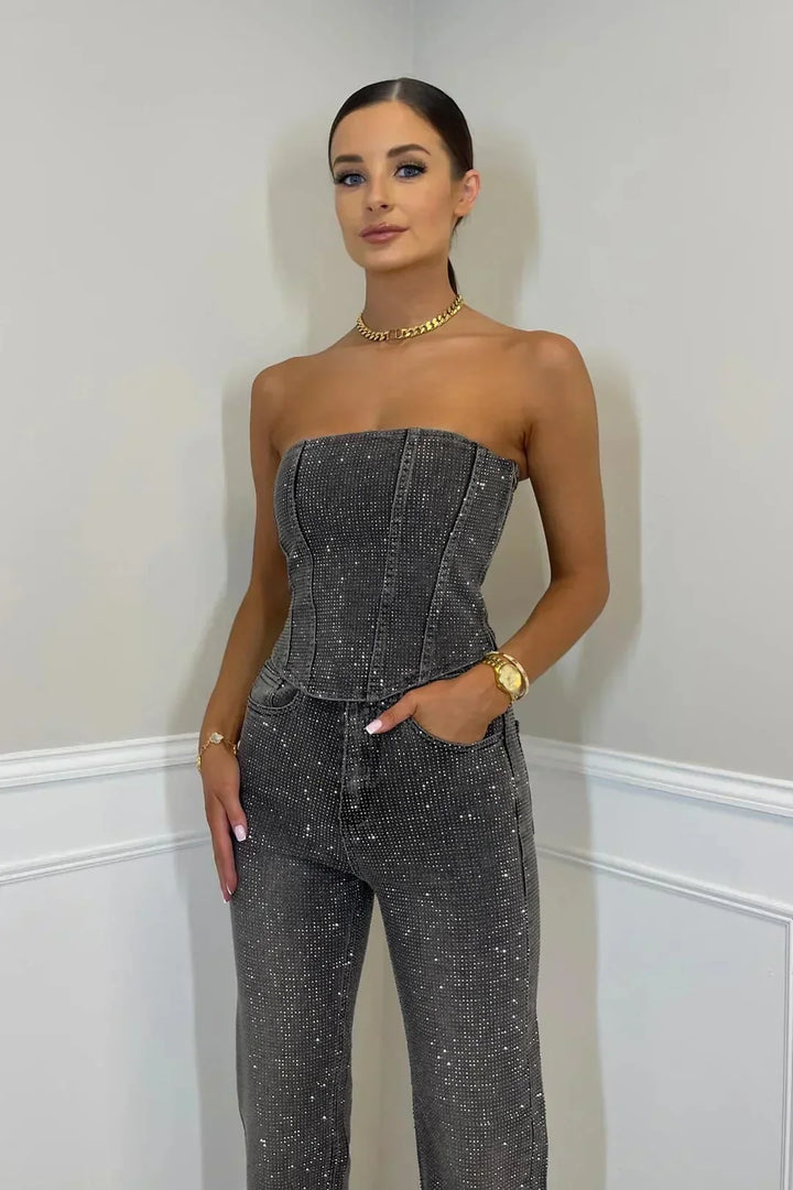 Women's versatile glitter crop top & high-waist jeans set. Trendy fashion outfit for night out or party.