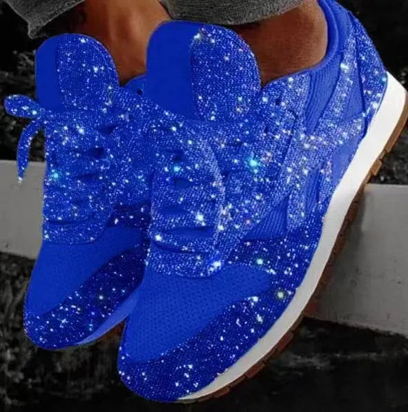 Side view of women's metallic glitter lace-up sneakers, offering comfortable everyday wear & a fashionable sparkle.