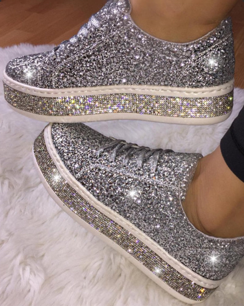 Women's glitter platform sneakers for a dazzling, elevated style. Perfect for fashion-forward casual wear.