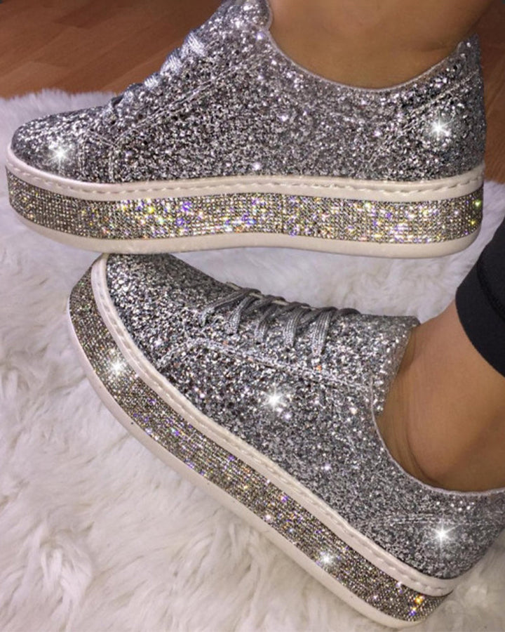 Women's glitter platform sneakers for a dazzling, elevated style. Perfect for fashion-forward casual wear.