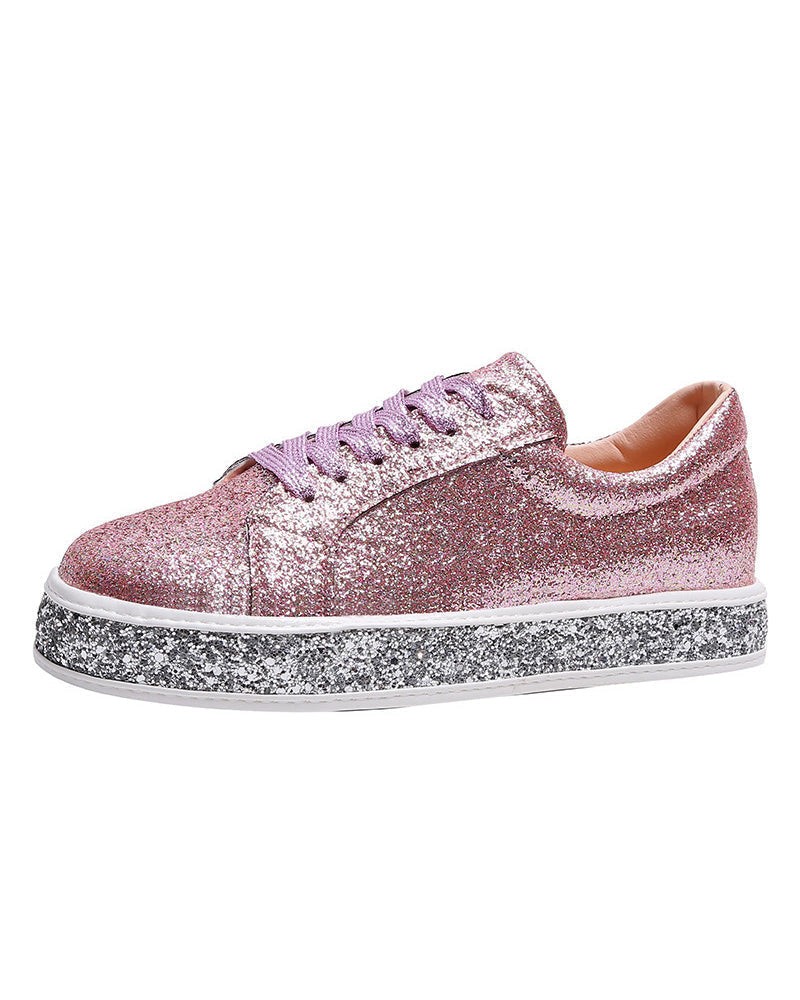 Trendy ladies' platform sneakers with glittering finish. Fashionable and comfortable for all-day wear.