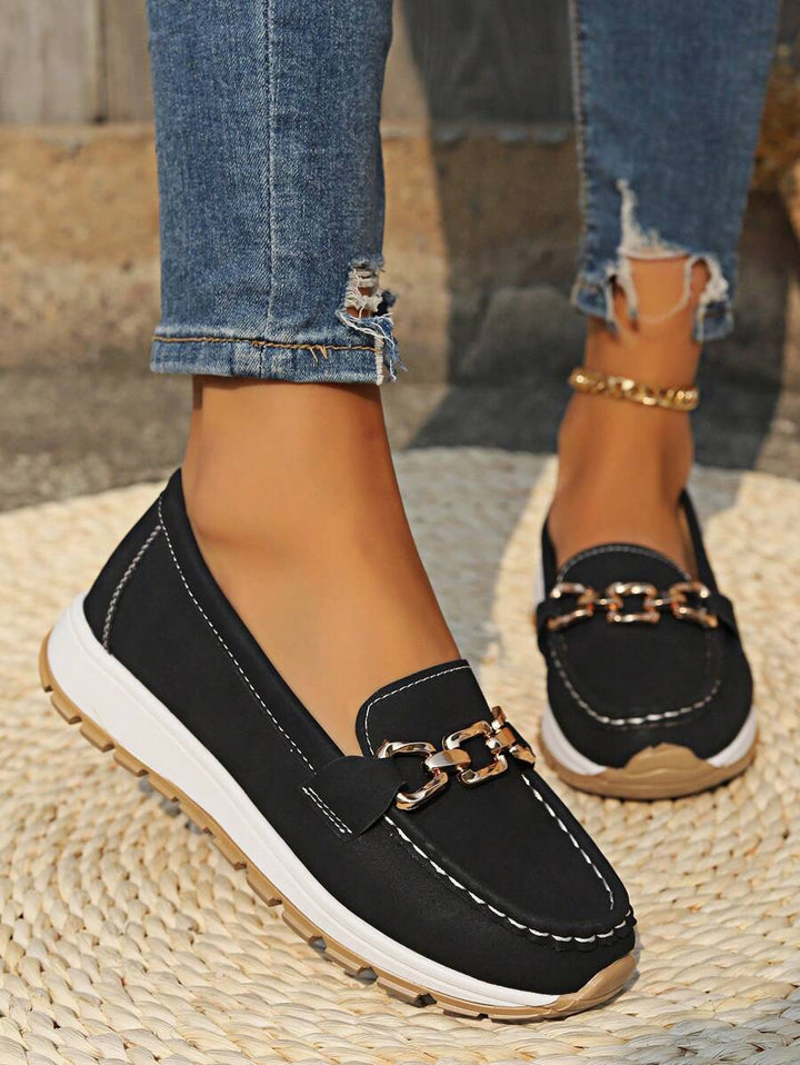 Women's gold chain flatform loafers with a round toe. Stylish slip-on casual shoes for everyday comfort.