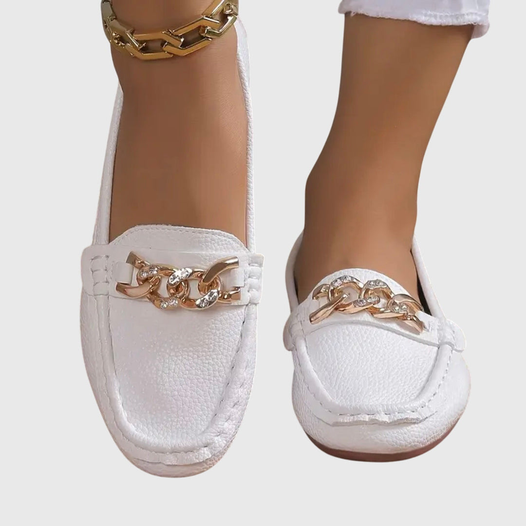 Premium women's gold-chain wedge loafers, enhanced with brilliant crystal details for chic style.