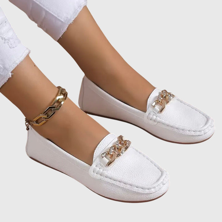 Must-have women's stylish loafers, comfortable wedge, striking gold chain & shimmering crystals.
