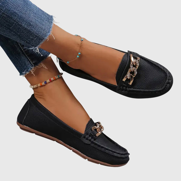 Dressy casual women's fashion loafers, with gold chain, crystal accents & comfortable wedge heel.