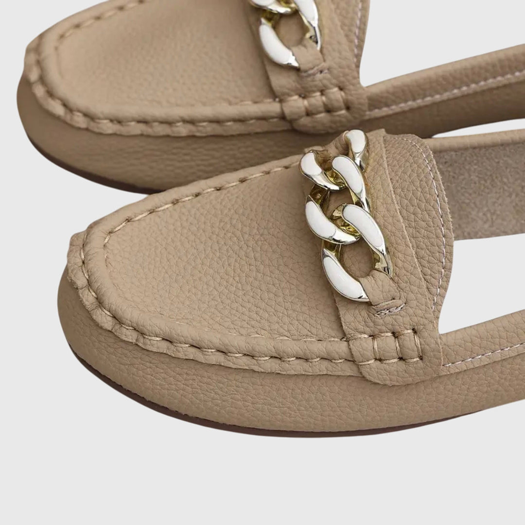 Versatile women's wedge loafers, perfect for dressy casual looks with gold chain & crystal details.