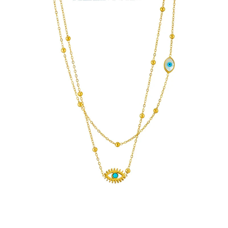 Stylish women's evil eye pendant necklace in gold, a layered protection jewelry piece made from durable stainless steel.