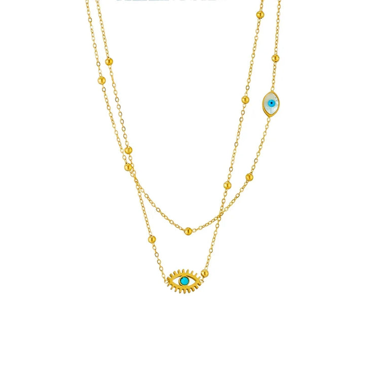 Stylish women's evil eye pendant necklace in gold, a layered protection jewelry piece made from durable stainless steel.