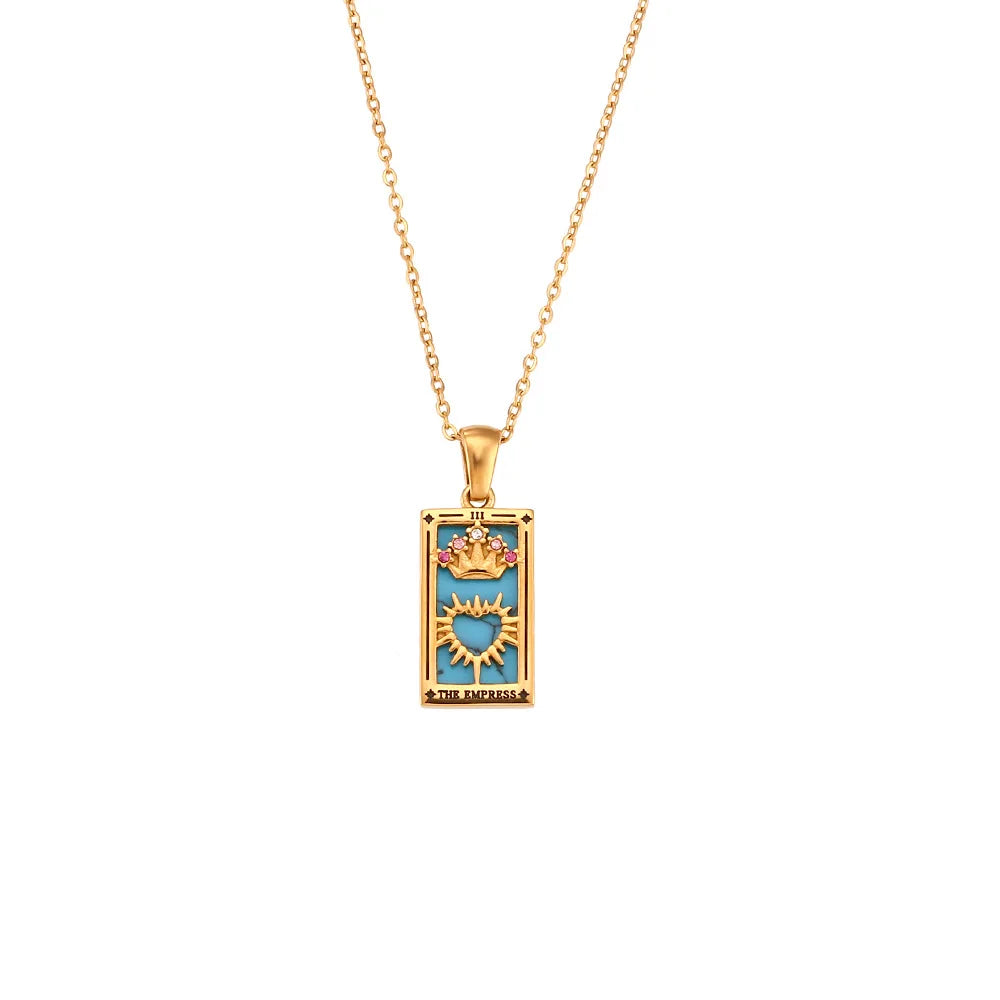 Women's gold symbolic tarot card pendant necklace, mystical spiritual jewelry accessory.