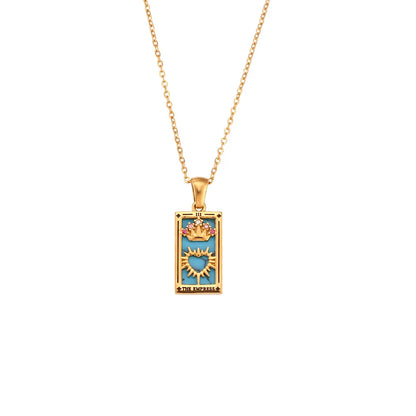 Women's gold symbolic tarot card pendant necklace, mystical spiritual jewelry accessory.
