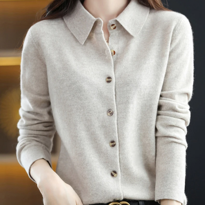 Classic women's collared button-up shirt with tortoiseshell buttons. Comfortable & stylish for everyday apparel.