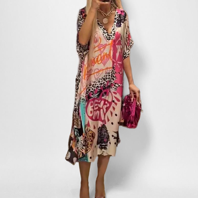 Stylish women's graphic print short sleeve swing dress. Comfortable knee-length tunic, great for summer fashion & daily wear.