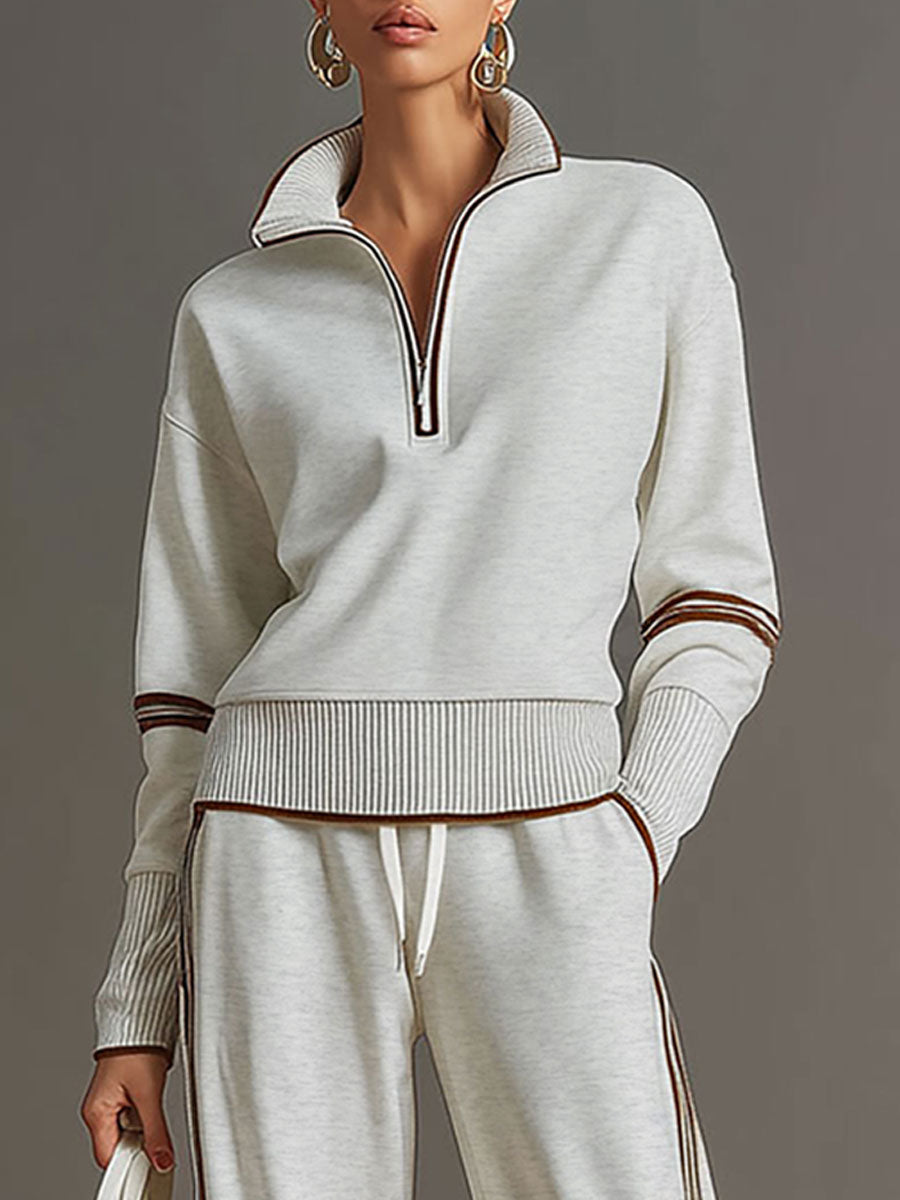 Stylish women's half-zip sweatshirt & wide-leg trouser co-ord. Perfect for casual or loungewear.