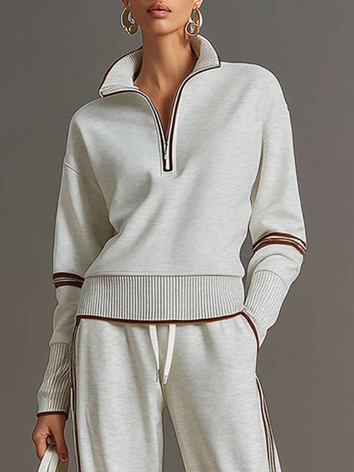 Stylish women's half-zip sweatshirt & wide-leg trouser co-ord. Perfect for casual or loungewear.