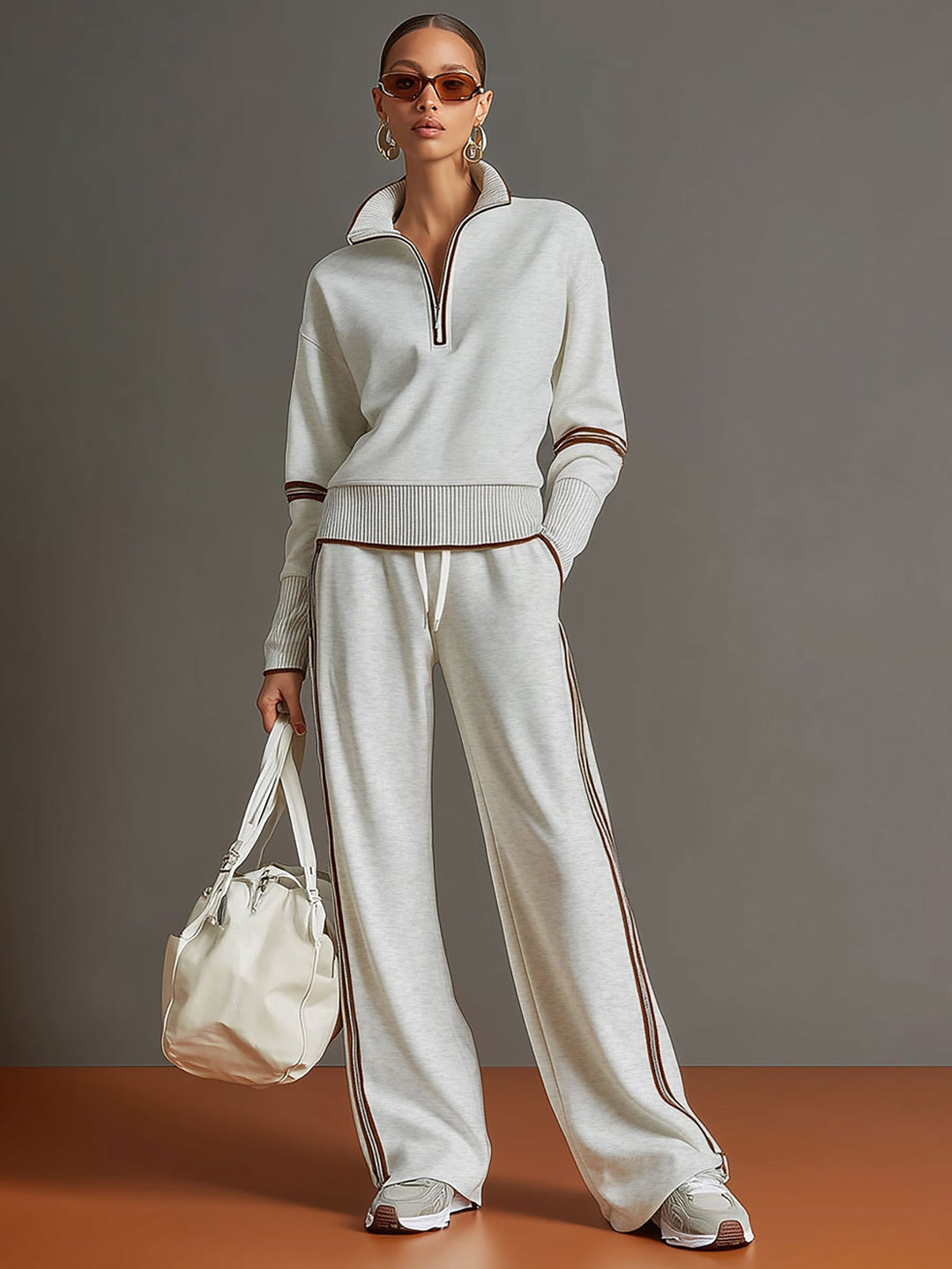 Comfortable women's loungewear set. Soft half-zip top & trendy wide-leg pants.