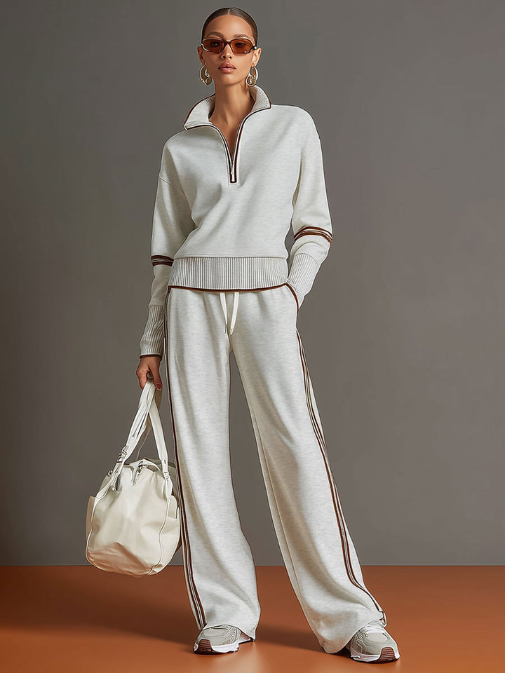 Comfortable women's loungewear set. Soft half-zip top & trendy wide-leg pants.