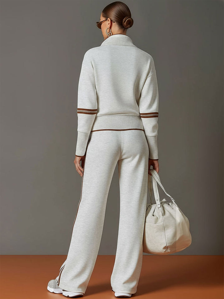 Stylish women's co-ord featuring a half-zip sweatshirt and chic wide-leg trousers.
