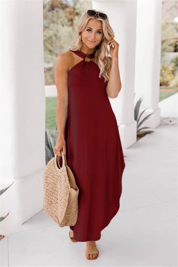 Vibrant women's beach halter maxi dress, stylish and comfortable, perfect for sunny summer days.