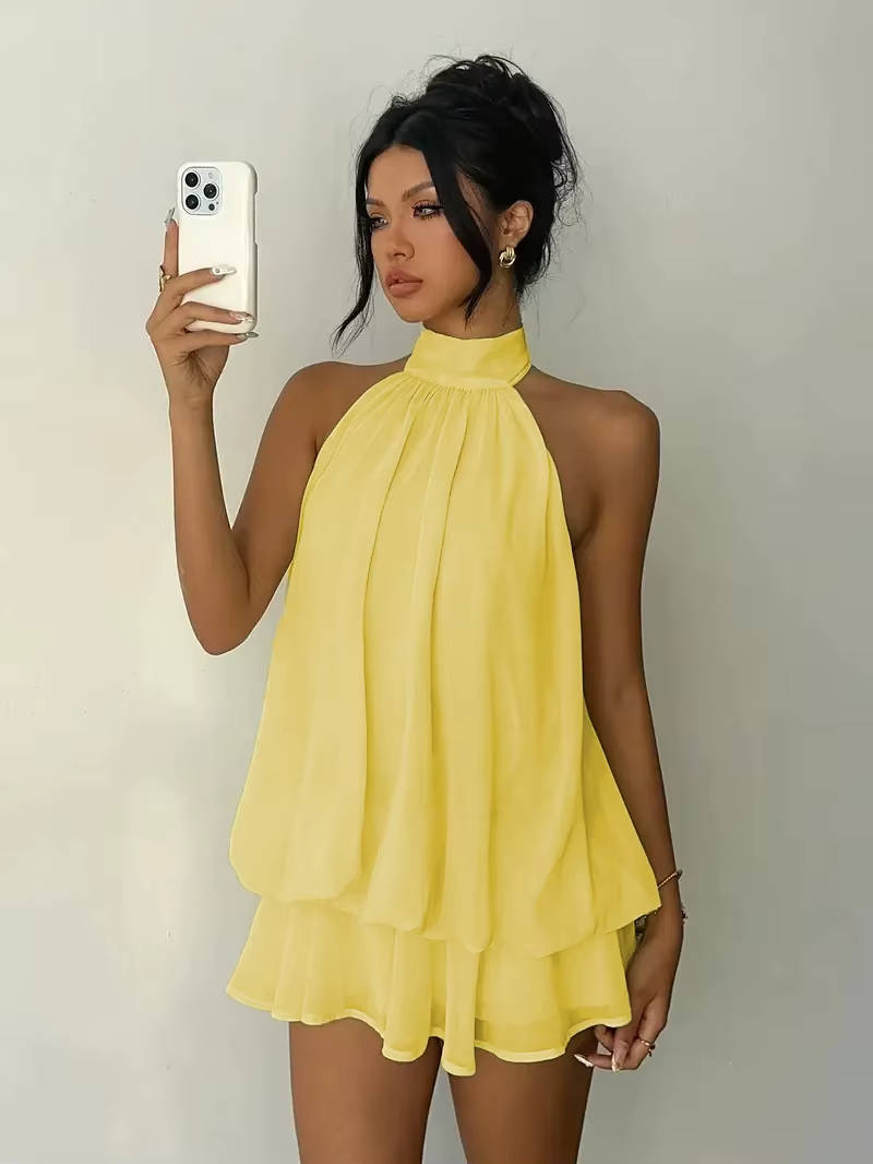 Women's Halter Mini Dress with Ruffle Hem & Open Back. Perfect party or cocktail event dress.