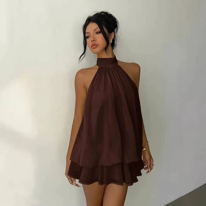 Trendy women's halter cocktail dress with a flowy ruffle hem and eye-catching open back design.