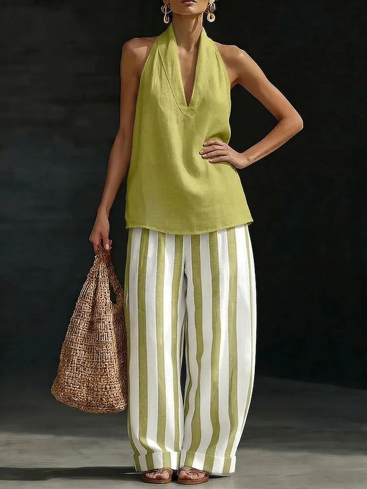 Comfortable women's resort wear set: chic halter top & wide leg pants. Ideal for warm weather casual style.