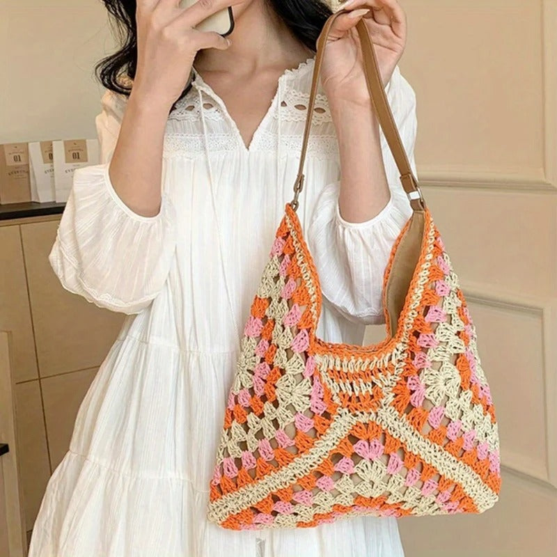 Women's hand-crocheted boho tote bag, perfect summer accessory for a unique style.