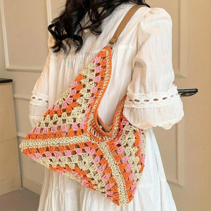 Handcrafted crochet tote bag for women, unique boho style shoulder accessory.