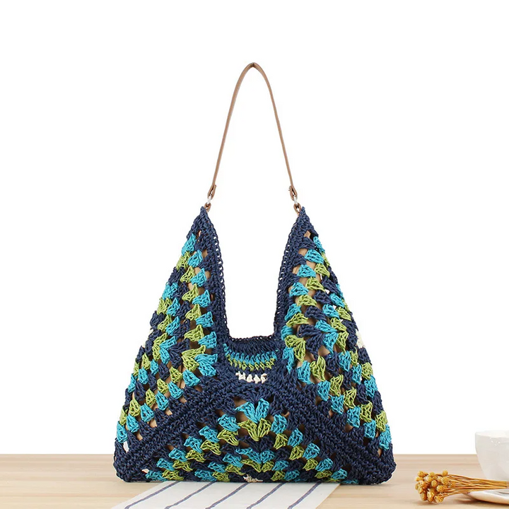 Durable hand-crocheted boho shoulder bag for women, a unique and lightweight summer accessory.