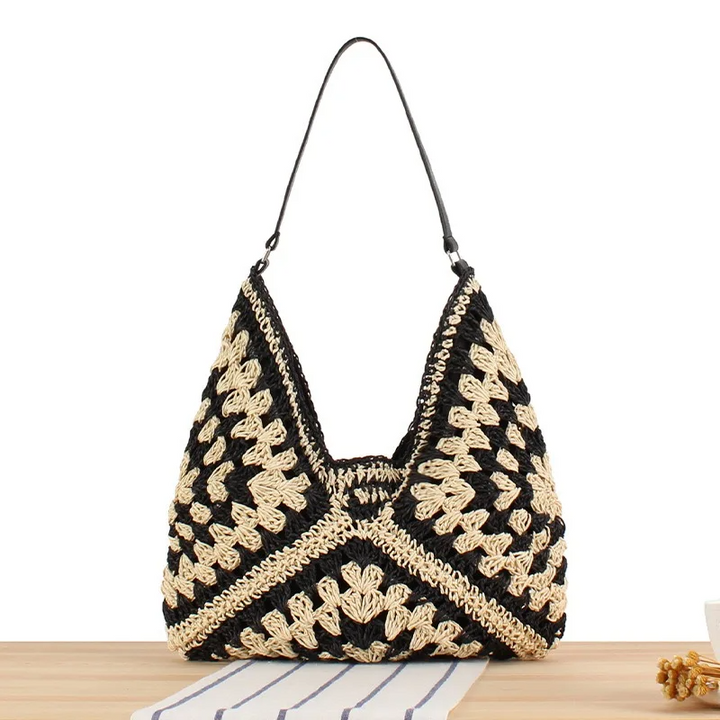 Versatile women's hand-crocheted boho tote bag, lightweight & chic for summer.