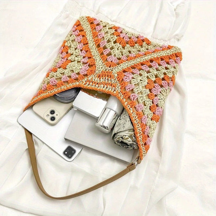 Unique women's hand-crocheted boho tote, a stylish and lightweight summer accessory.