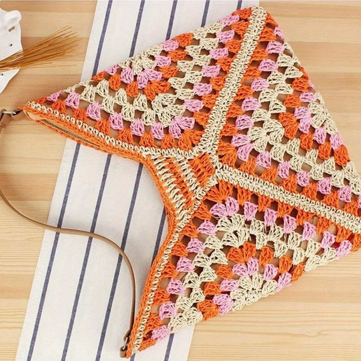 Artisan hand-crocheted boho shoulder bag for women, a beautiful summer accessory.