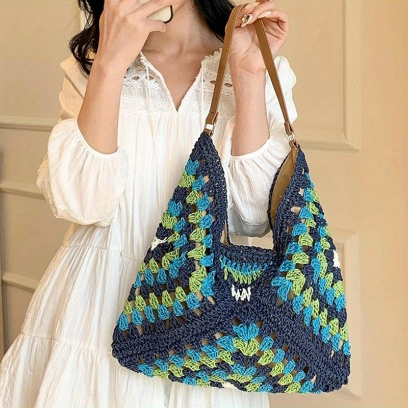 Lightweight women's hand-crocheted boho tote bag, perfect for summer outings.