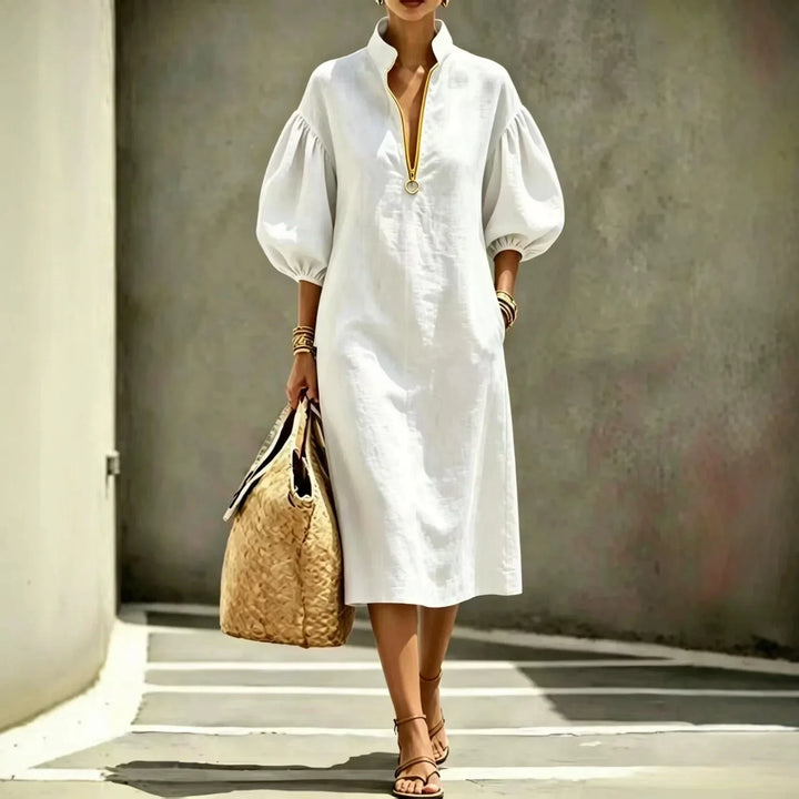 Chic women's Haven Beck midi dress featuring trendy bubble sleeves and a relaxed fit, ideal for modern casual wear.