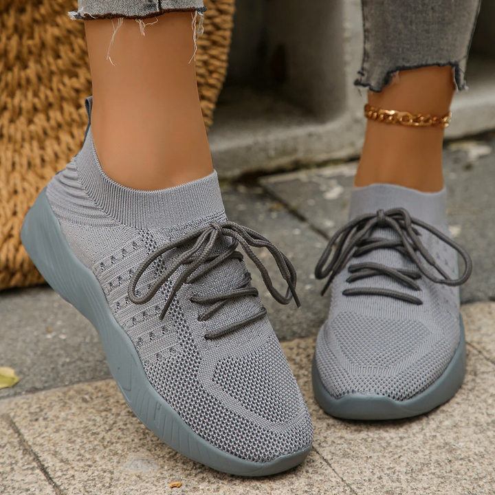 Versatile women's slip-on walking shoes, lightweight & breathable for active lifestyles.