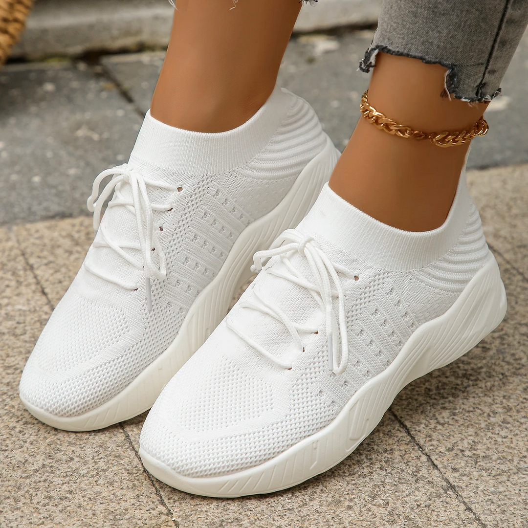 Lightweight women's walking shoes, breathable stretch design for daily comfort & activity.