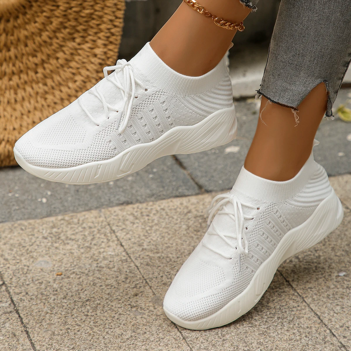 Easy slip-on women's sneakers, cushioned & supportive, ideal for daily activities.